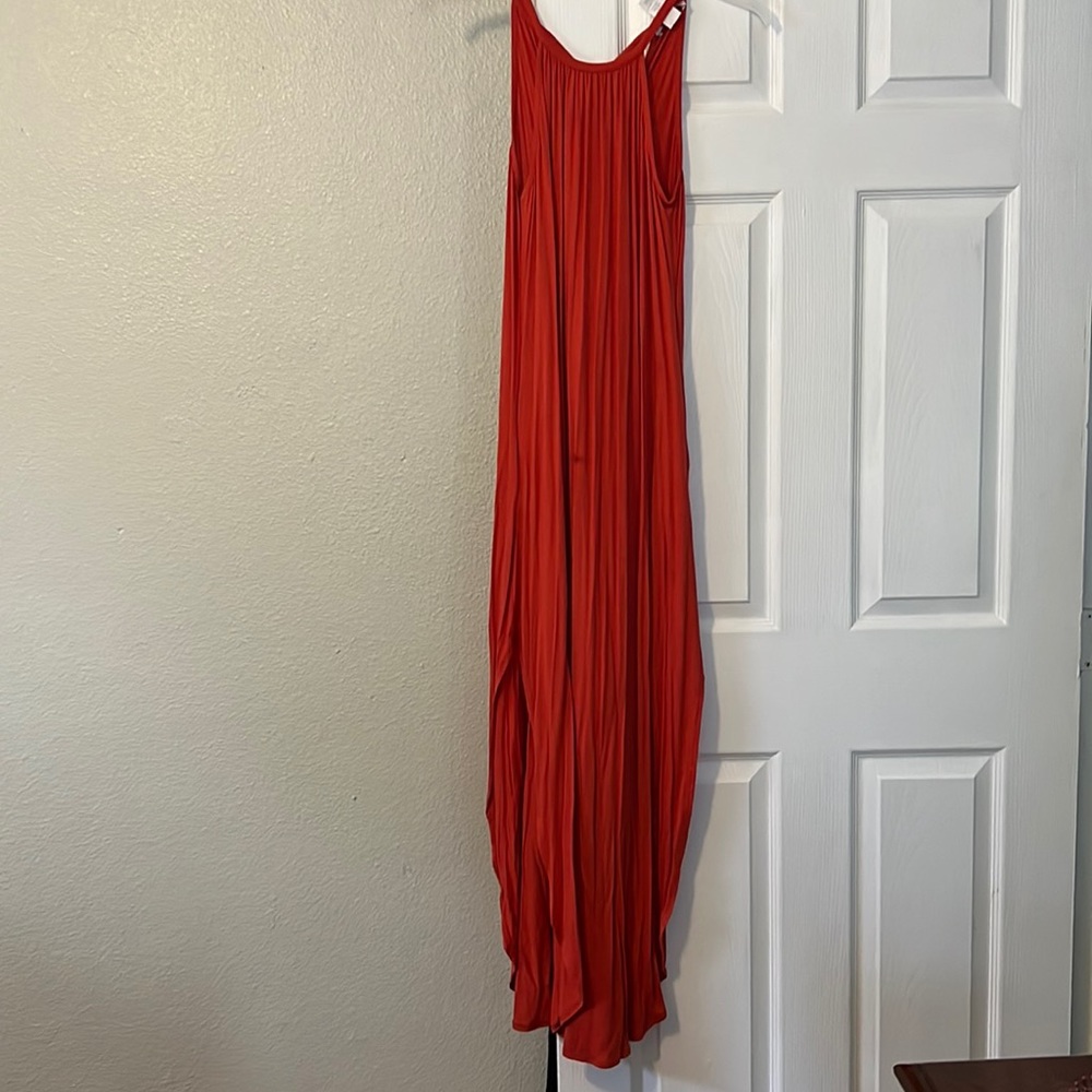 Long orange tangerine color dress size small it’s from dillards! Never worn
